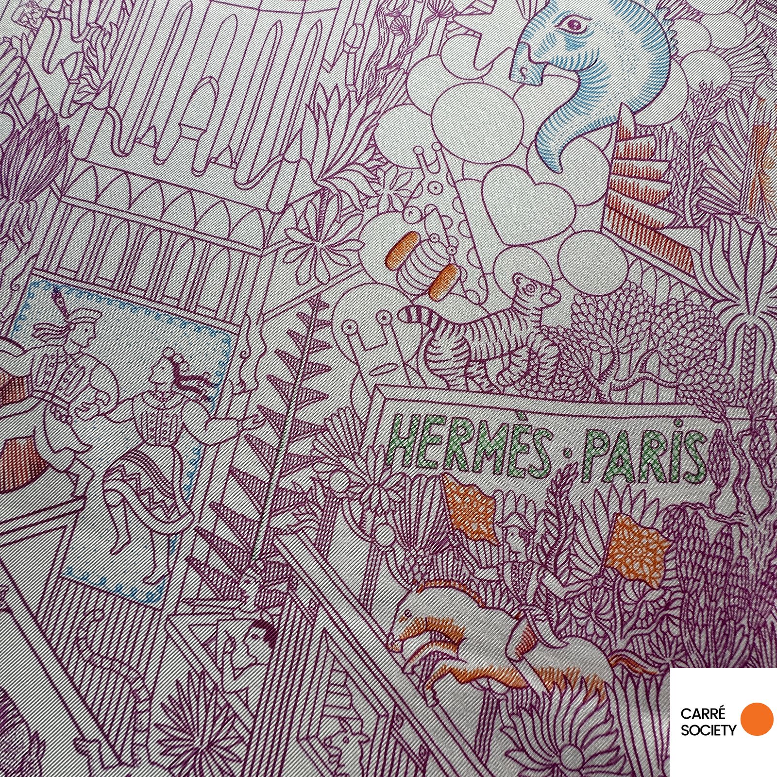 Signature Hermès Paris dans le décor : logo Hermès intégré à la composition, entouré d’illustrations ludiques et colorées.